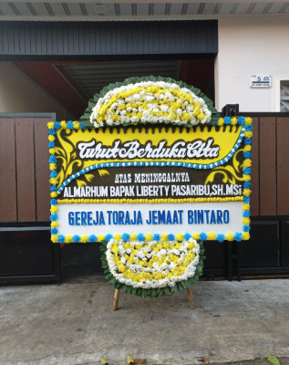 Papan Bunga Duka di Sumber Sari